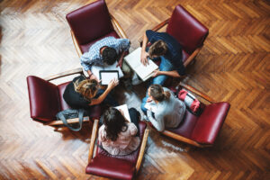 Student meeting in library - Teamwork |