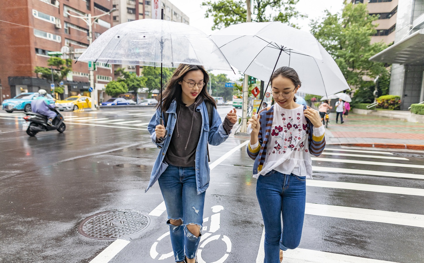 asian women crossing street
