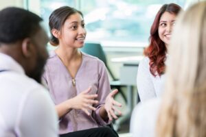 Businesswoman shares ideas during meeting