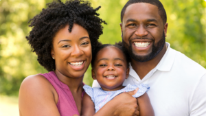 A family smiling at the camera