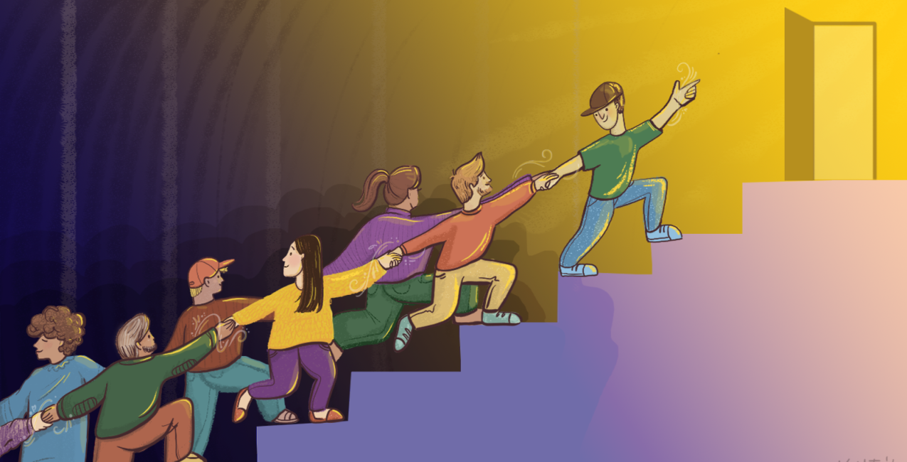 Des hommes et des femmes travaillant ensemble pour surmonter un obstacle difficile